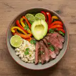 healthy steak fajita bowl recipe with vegetables and rice