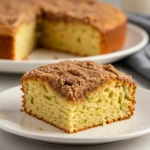 Cinnamon Sugar Zucchini Coffee Cake slice on a white plate