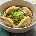 Potsticker Soup in a cozy bowl with fresh cilantro