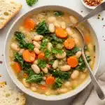 Tuscan white bean soup with carrots, kale, and rustic bread
