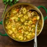 Chicken Tortellini Soup in a rustic bowl