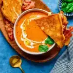 creamy tomato bisque soup recipe with basil and grilled cheese