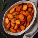 Glazed carrots in a bowl with brown sugar butter glaze