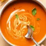 homemade tomato soup recipe with basil and cream swirl