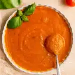 Simple Roasted Tomato Soup served with grilled cheese and basil