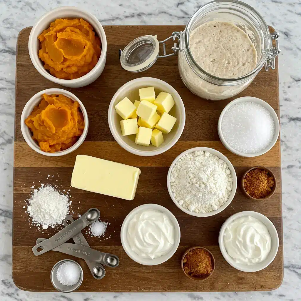 Sourdough pumpkin scones ingredients laid out on a wooden board