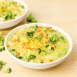 Best Broccoli Potato Cheese Soup in a bowl with melted cheddar