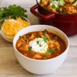 Chicken Salsa Soup in bowl with toppings