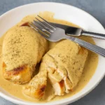 Chicken with Mustard Cream Sauce plated with sides
