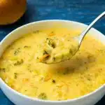 creamy crockpot broccoli cheddar soup in bowl