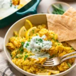 dump-and-bake chicken tzatziki with rice in a casserole dish