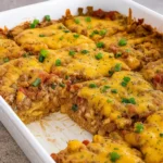 Easy Baked Burrito Casserole Recipe with melted cheese and beef