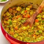 Hearty One-Pot Lentil Stew in a rustic Mediterranean kitchen