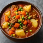Hearty Slow Cooker Vegetable Soup in rustic bowl