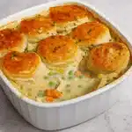 Homemade Chicken Pot Pie Casserole freshly baked in white dishHomemade Chicken Pot Pie Casserole freshly baked in white dish