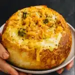 Homemade Panera Broccoli Cheese Soup in bread bowl.