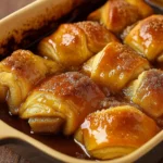Pioneer Woman’s Apple Dumplings in cinnamon syrup with ice cream