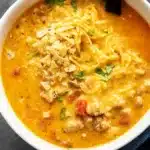 Slow Cooker Beefy Nacho Soup served in rustic bowl