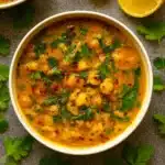 turmeric soup with chickpeas orzo and spinach