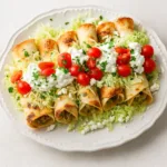 Creamy Chicken and Spinach Taquitos recipe crispy golden tortillas
