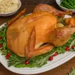 Dry Brine Cheesecloth Turkey roasted golden with butter and herbs