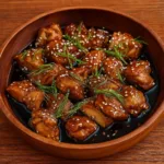 Dump and Go Crockpot Teriyaki Chicken in slow cooker with garnish