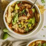 Leftover Turkey Tortilla Soup with tortilla chips and lime