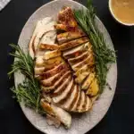 Oven Roasted Turkey Breast with golden skin and herbs