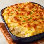 Paula Deen Amazing Chicken Casserole baked with golden cheese
