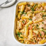 baked feta pasta with salmon in creamy tomato sauce