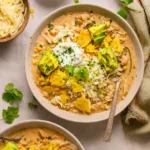 Crockpot Healthy White Chicken Chili served in a bowl with toppings