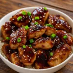 Easy Teriyaki Chicken served over rice with sesame seeds