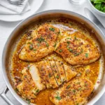 Garlic Butter Chicken in skillet with sauce