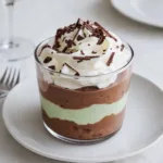 Shamrock Shake Pudding Cups dessert with mint and chocolate layers