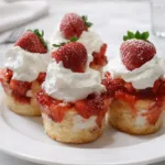 Strawberry Shortcake Cups layered with whipped cream and strawberries