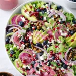 Blueberry Pistachio Spring Salad with avocado, feta, and pomegranate