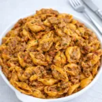 Creamy Beef and Shells pasta in a bowl with cheese