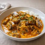 Hungarian Mushroom Paprikash served in a bowl with noodles
