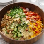 A vibrant bowl of the Best Chicken Pasta Salad with grilled chicken and fresh vegetables.