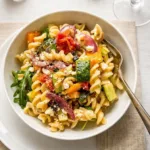 Roasted Veggie Pasta with Feta in bowl with roasted vegetables