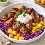 Jerk Chicken and Mango Slaw Bowls with Honey Lime Cream finished dish